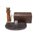 A carved figure of a monk, 26cm high, a Spanish carved box with domed cover, 29.