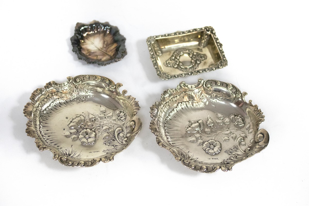 A pair of Victorian leaf-shaped silver bonbon dishes, import marks London 1894, 15.5cm long, a small