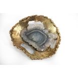 A geode crystal brooch of modern design,