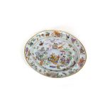 A Cantonese famille rose oval meat dish, circa 1860, decorated figures and flowers,