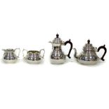 A silver tea and coffee service, Richard Comyns, London 1969, of circular shape comprising teapot,