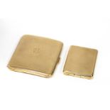 A 9ct gold cigarette case with presentation inscription and date and a 9ct gold vesta case with