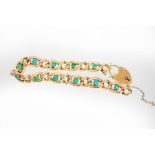 A turquoise and 9ct gold bracelet with heart-shaped padlock clasp, 19.5cm long, approximately 16.