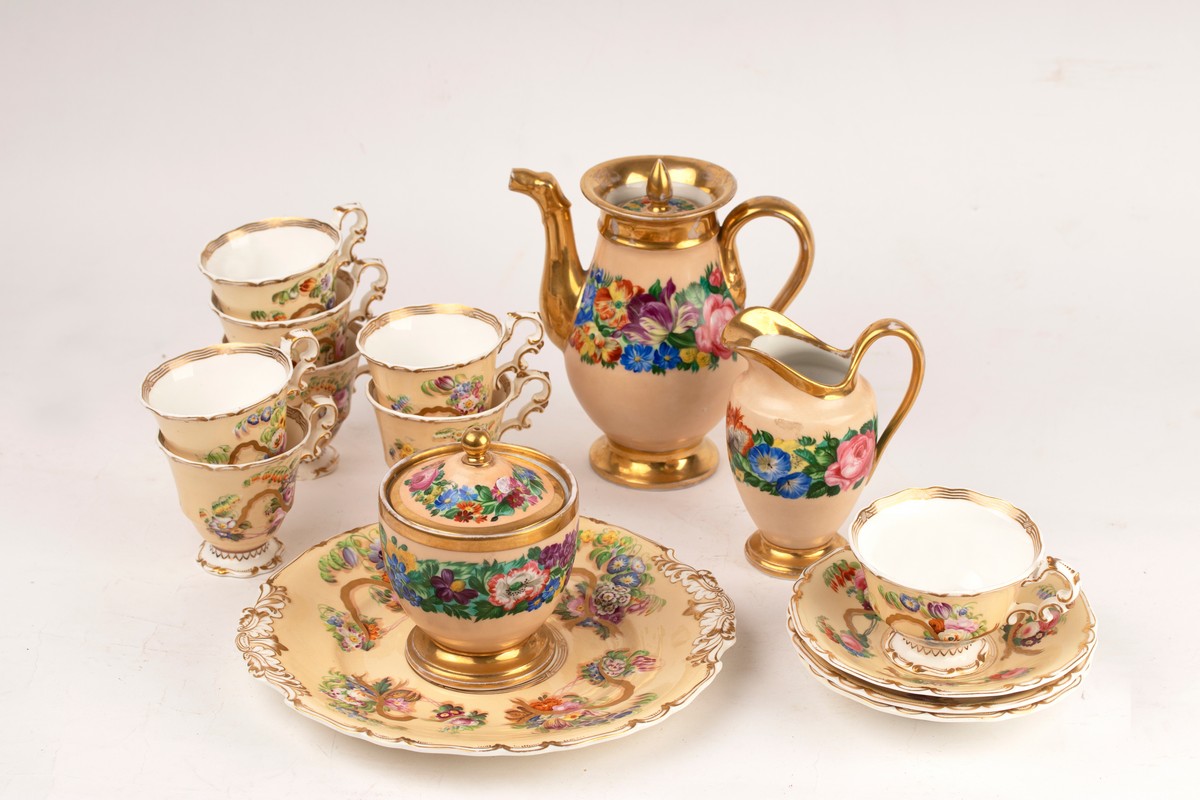 A Paris porcelain coffee pot, milk jug and sugar bowl, circa 1830,