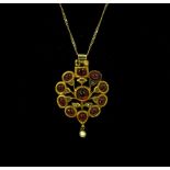 A Mughal style ruby, diamond and enamel pendant, adapted,