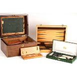 A rosewood humidor containing an assortment of cigars including Cohiba, the humidor 30.