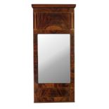 An Edwardian mahogany wall mirror, boxwood strung and inlaid Corinthian pillars and patera,