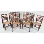 A set of eight ladderback dining chairs including two armchairs CONDITION REPORT: