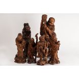 Six Chinese carved root wood figures of immortals,