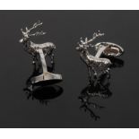 A pair of Holland & Holland stag form cufflinks,