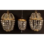A pair of gilt metal pendant ceiling lights,