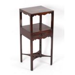 A George III mahogany pot stand, the central tier fitted with a drawer,