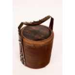 A Japanese wicker basket with handle,