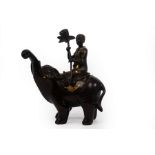 A Japanese bronze censer modelled as an elephant ridden by a boy, Meiji period,