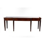 A George III mahogany breakfront serving table,