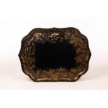 A black lacquer tray, Clay, King St, Cov't Garden, of serpentine outline highlighted in gilt,