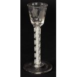 An 18th Century cordial glass with double series opaque twist stem,