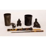 A collection of small bronzes comprising two figures,