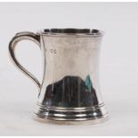 A silver Christening mug, London 1911, of plain waisted form, 9cm high,