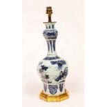 An 18th Century Delft octagonal bottle vase with onion bulb neck, chinoiserie decorated,