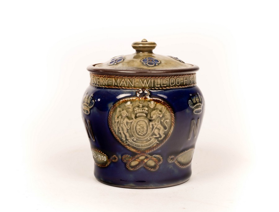 A Doulton Lambeth Lord Nelson tobacco jar and lid,