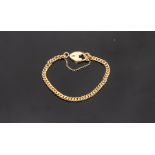 An 18ct yellow gold curb link bracelet with heart shaped padlock clasp, approximately 24.