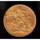 A George V gold sovereign,