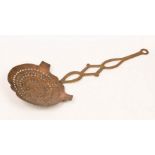 A 19th Century brass chestnut roaster,