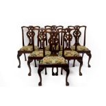 A set of six Chippendale style mahogany splat back dining chairs,