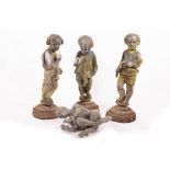 Three lead figures of putti,