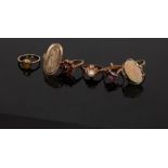 A quantity of dress rings including a garnet cluster ring, set in 9ct yellow gold, size N,