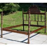 A Portuguese walnut bed,