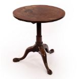 An early 19th Century mahogany circular table on a bobbin turned column and tripod support,