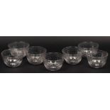 A set of seven cut glass finger bowls,