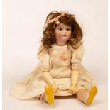 A porcelain headed doll by Simon & Halbig, the head marked K & R and numbered 46x,