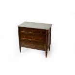 A Louis XVI style commode, the marble top over three long drawers on fluted tapering legs,