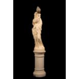 A French lamp modelled as a white plaster figure of a maiden with flowing robes and holding a