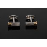 A pair of Holland & Holland shotgun cartridge cufflinks,