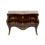 A French kingwood and rosewood ormolu mounted serpentine commode with marble top,