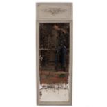 A late 19th Century wall mirror, the frieze carved grapes, vines and musical instruments,
