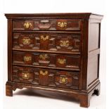 A 17th Century oak chest with plain rectangular top,