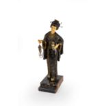 A table lamp, the bulb supported by a figure of a Japanese girl wearing a decorative robe, her head,