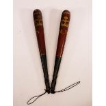 A pair of painted Victorian truncheons,