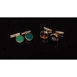 A pair of smoky quartz cufflinks set in 18ct gold and another pair of cufflinks of unhallmarked