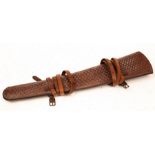 A Cowboy's leather rifle scabbard, decorated/Note: From the Glenn Tutssel collection,