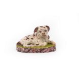 A Chelsea porcelain figure of Hogarth's pug 'Trump', circa 1745-47,