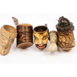 A collection of meerschaum and other pipes and cheroot holders, the bowls in the form of animals,