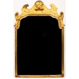 A George I style gilt framed mirror with shell to the crest, later mirror plate,