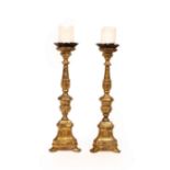 A pair of Italian altar type candlesticks,