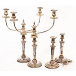 Four Sheffield plated candlesticks with two, two-branch candelabra attachments,